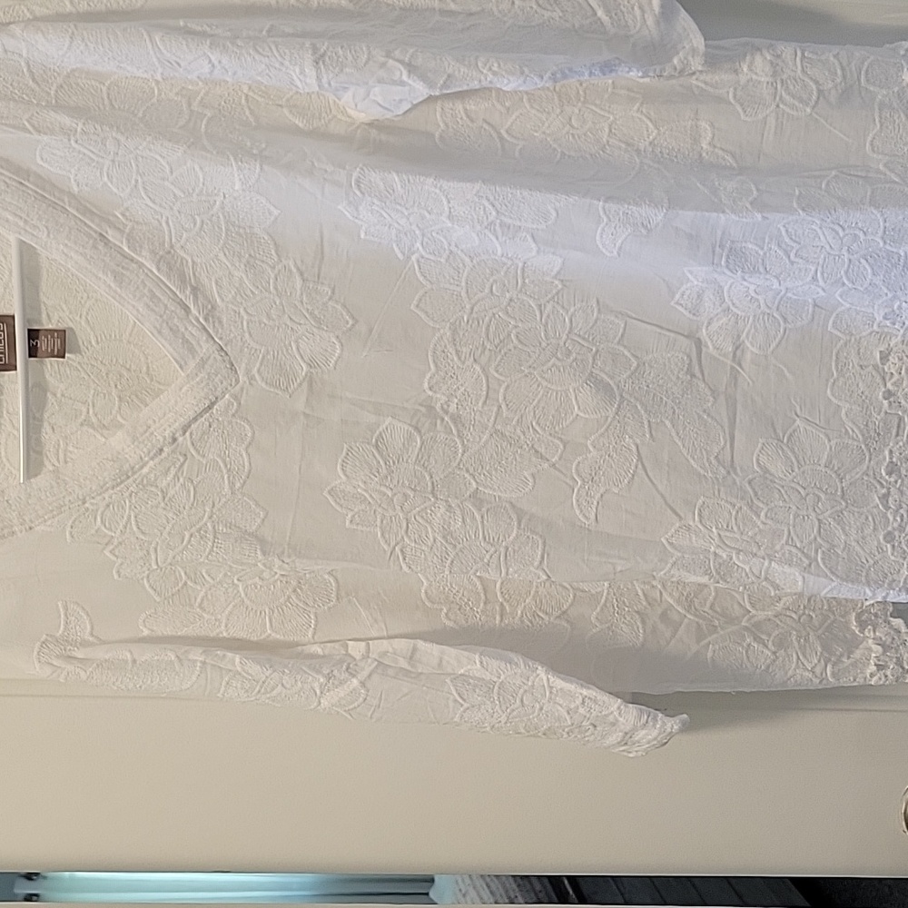 Pull-over white blouse. Chico's white, intricate detailed embroidery